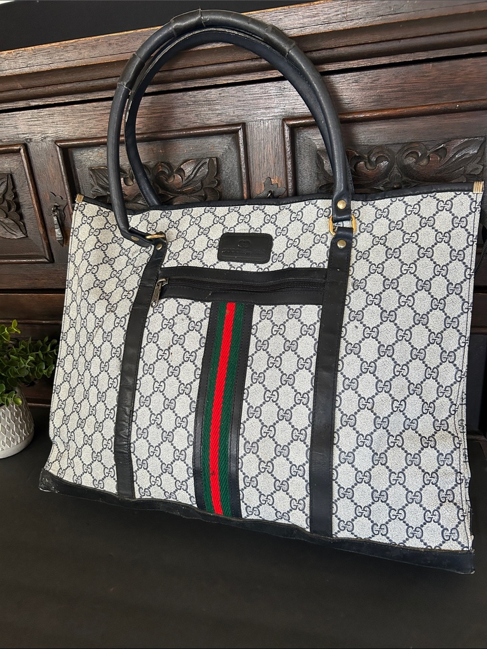 Beautiful Beige GG Canvas Duffel with Black Trim and Signature Web Stripe